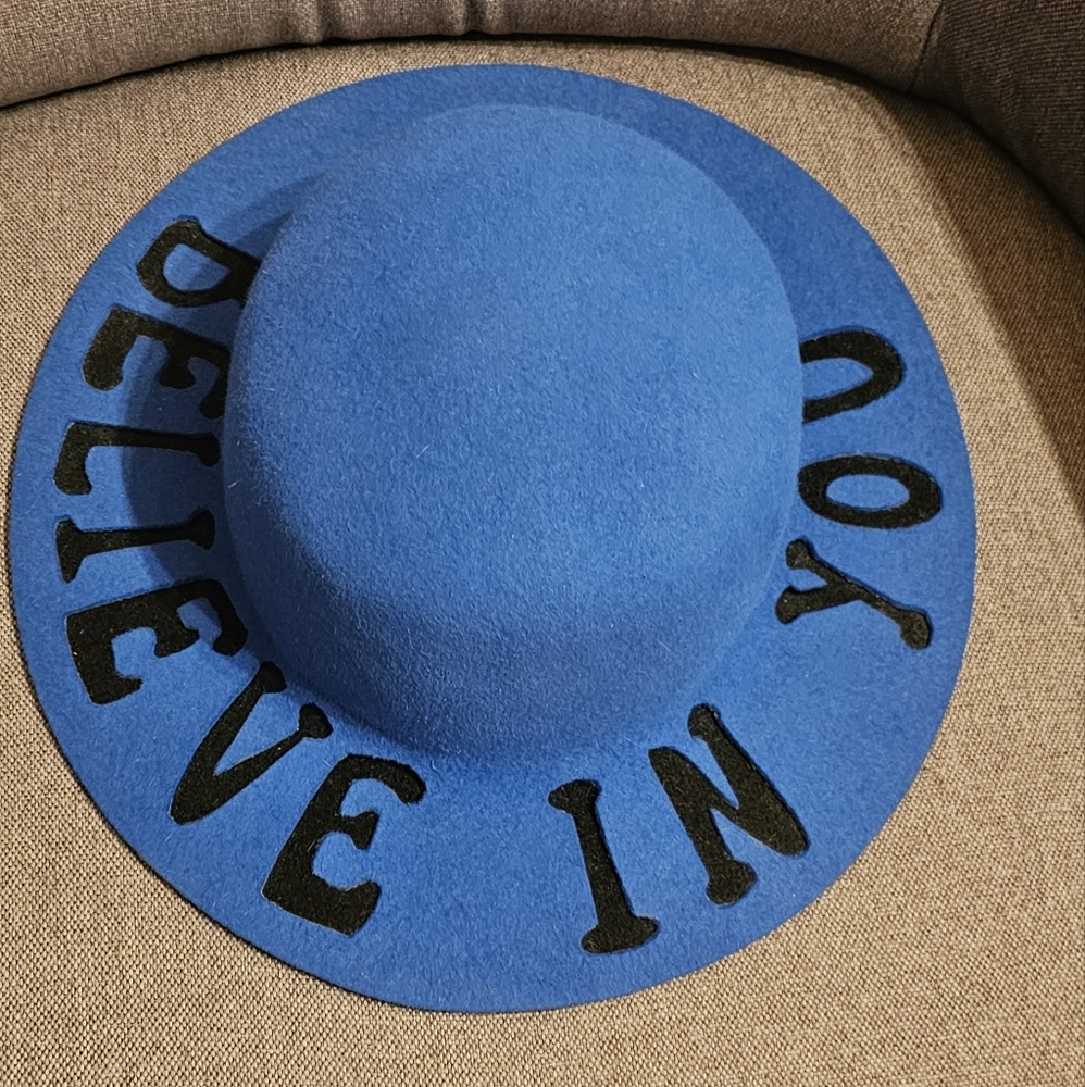 Stylish Blue Hat with Bold Black Text
